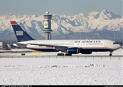 Un decollo con la neve a Malpensa